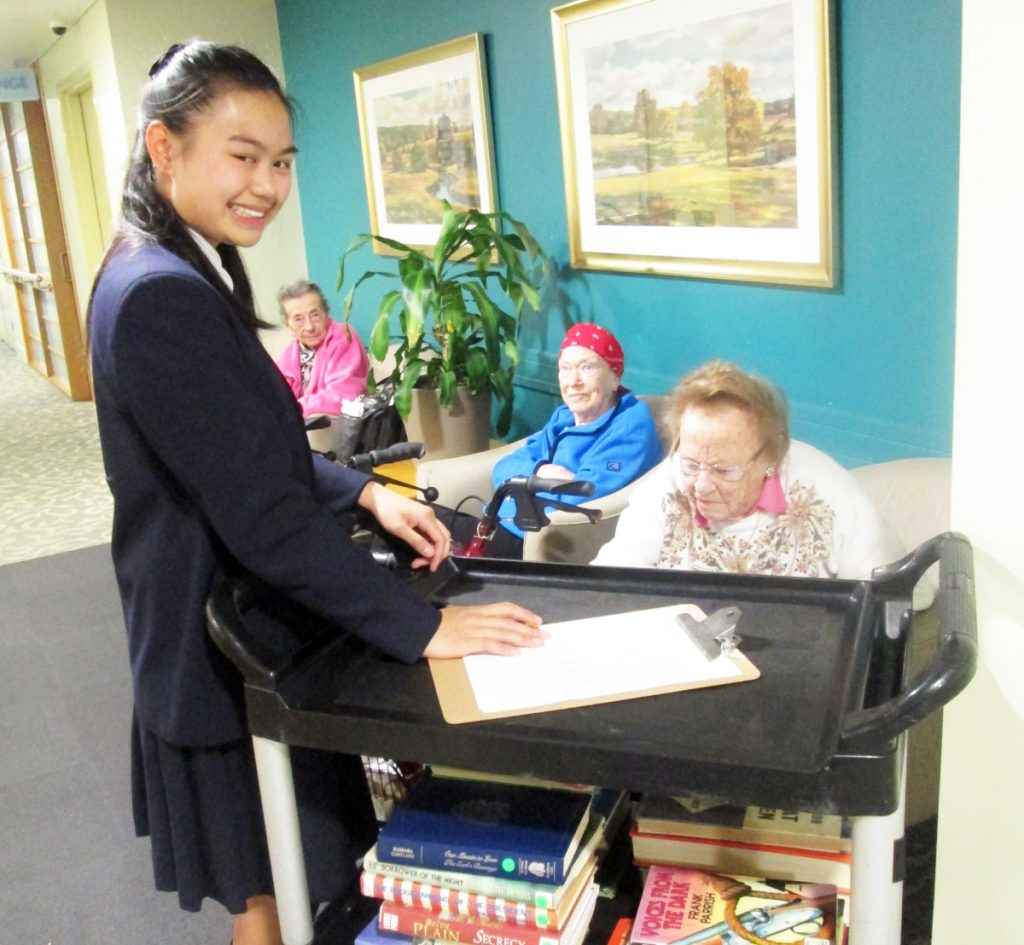 Tiana with her Library Cart
