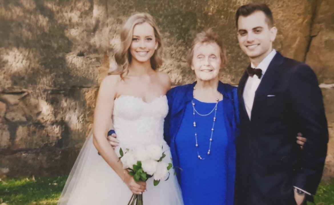 Proud grandmother attends waterfront wedding